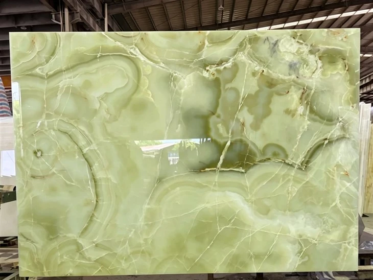 Polished Afghan Green Onyx slab submitted for client approval before tile cutting.